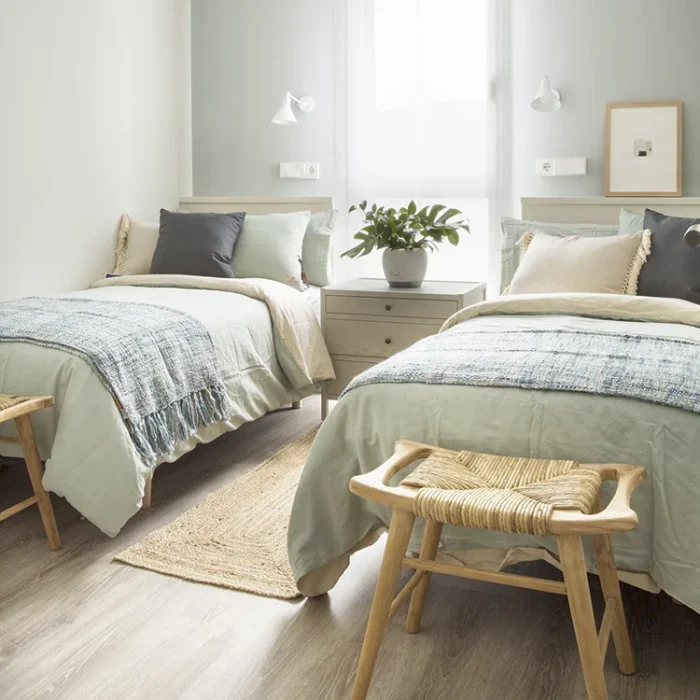 Dormitorio con dos camas - Proyecto de reforma integral e interiorismo de piso en Sant Just