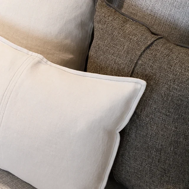 Textura de cojines en el sofá del salón - Proyecto Eixample